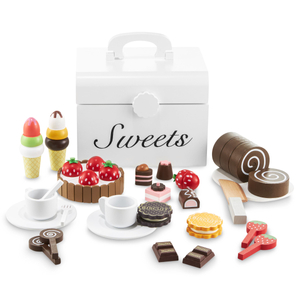 Caja de madera con dulces para cortar, confitería.