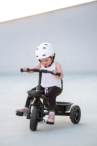 Triciclo HyperMotion TOBI VECTOR: ruedas infladas permanentemente + empujador. De color negro.