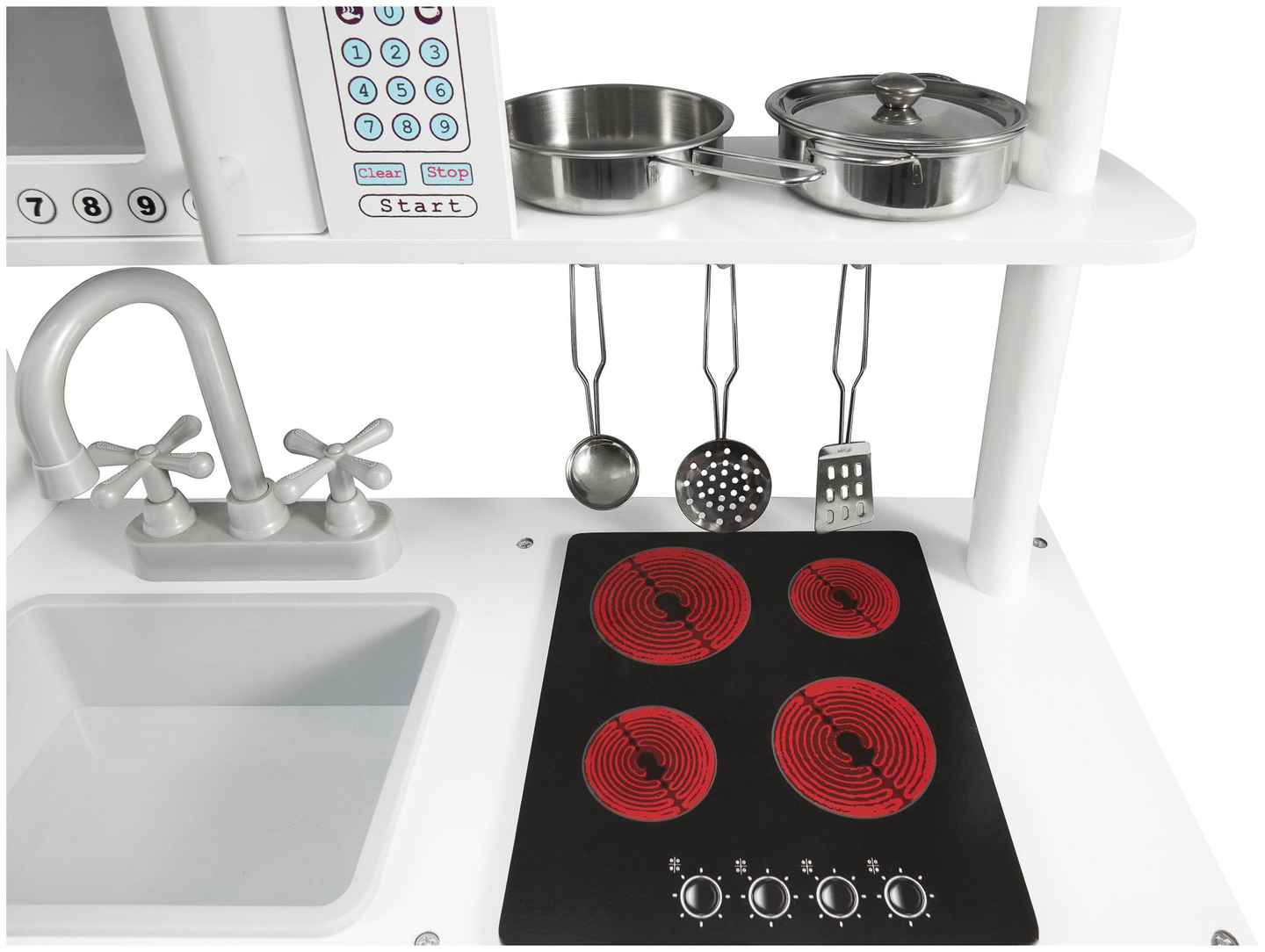 Grandes accesorios de cocina blancos de madera y delantal.