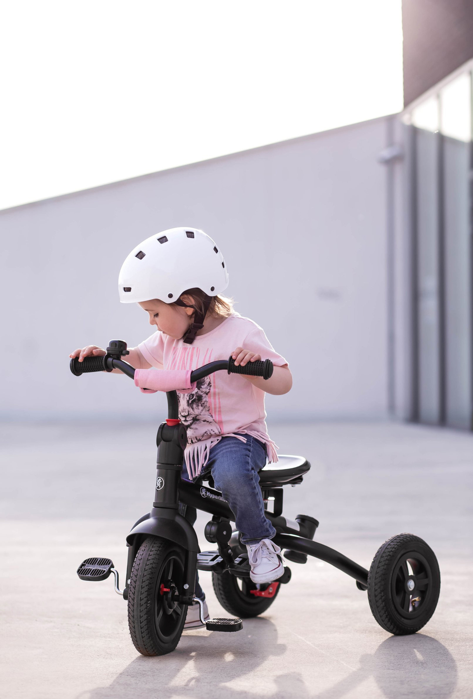 Tobi Velar triciclo + funda impermeable - rosa