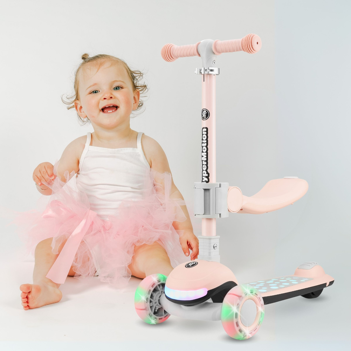 Patinete de equilibrio 3 en 1 HyperMotion LUMI - plataforma iluminada y ruedas LED, color rosa