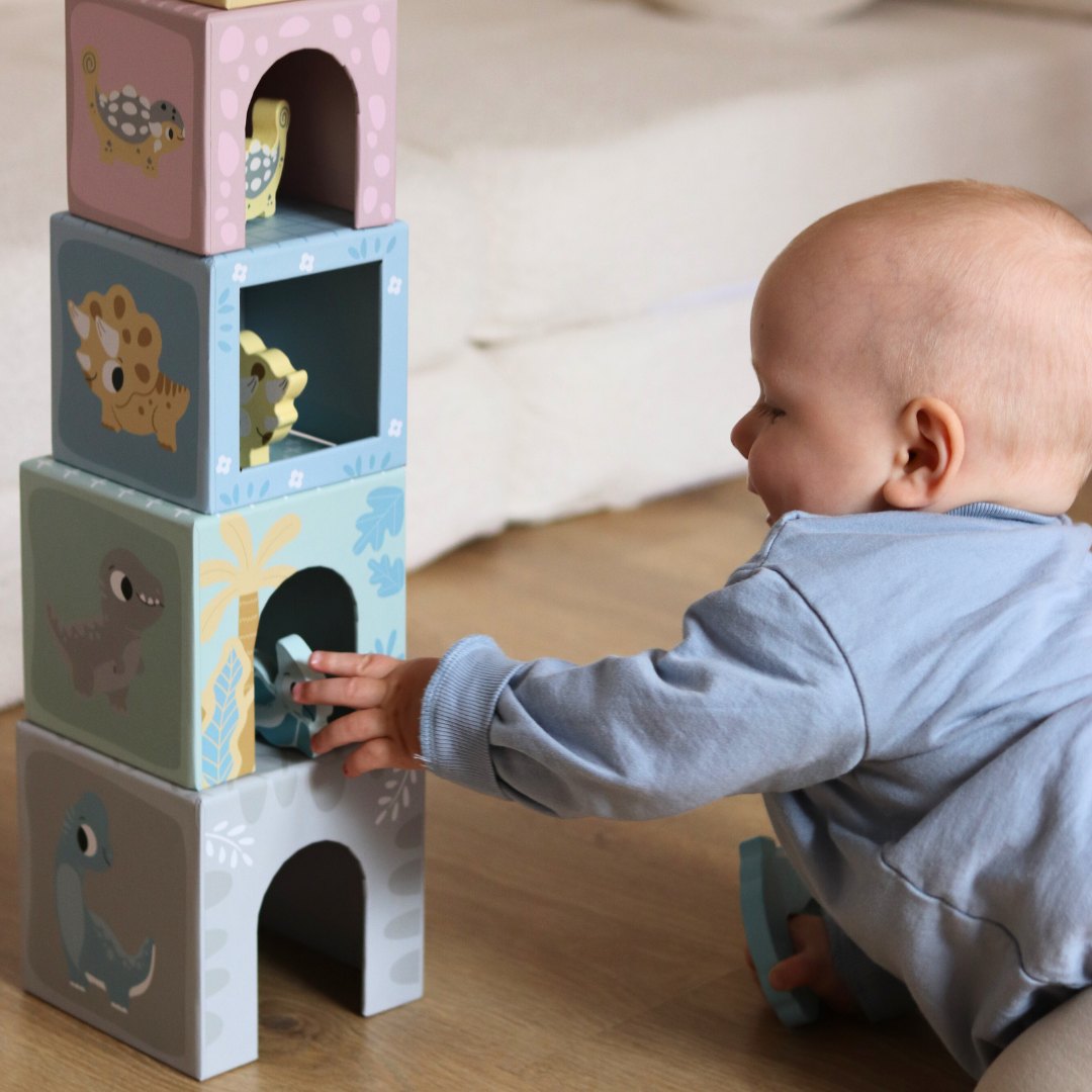 Torre - clasificador con figuras de dinosaurios