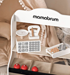 Minimercado: una tienda con báscula, terminal, tarjeta de pago y fruta.