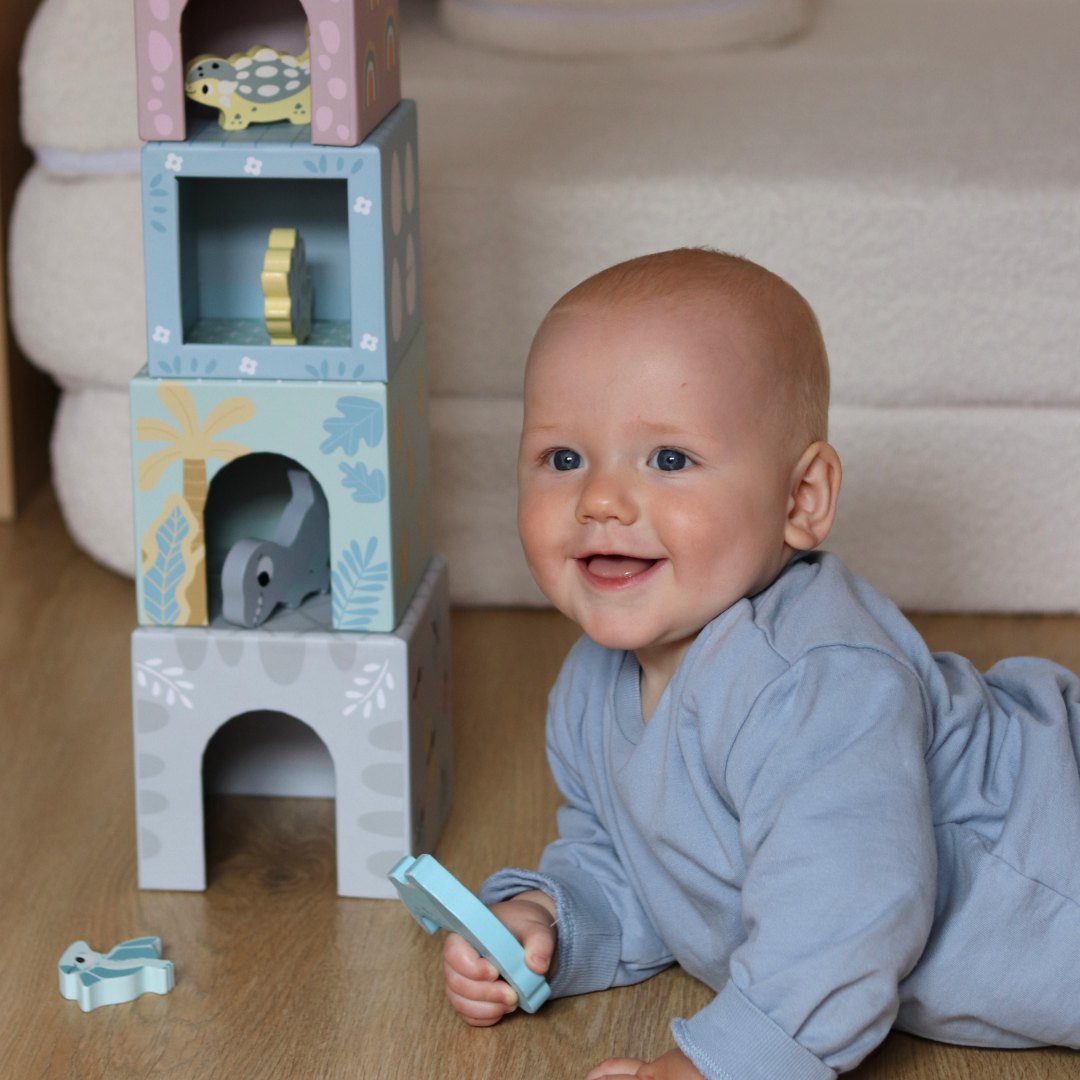 Torre - clasificador con figuras de dinosaurios